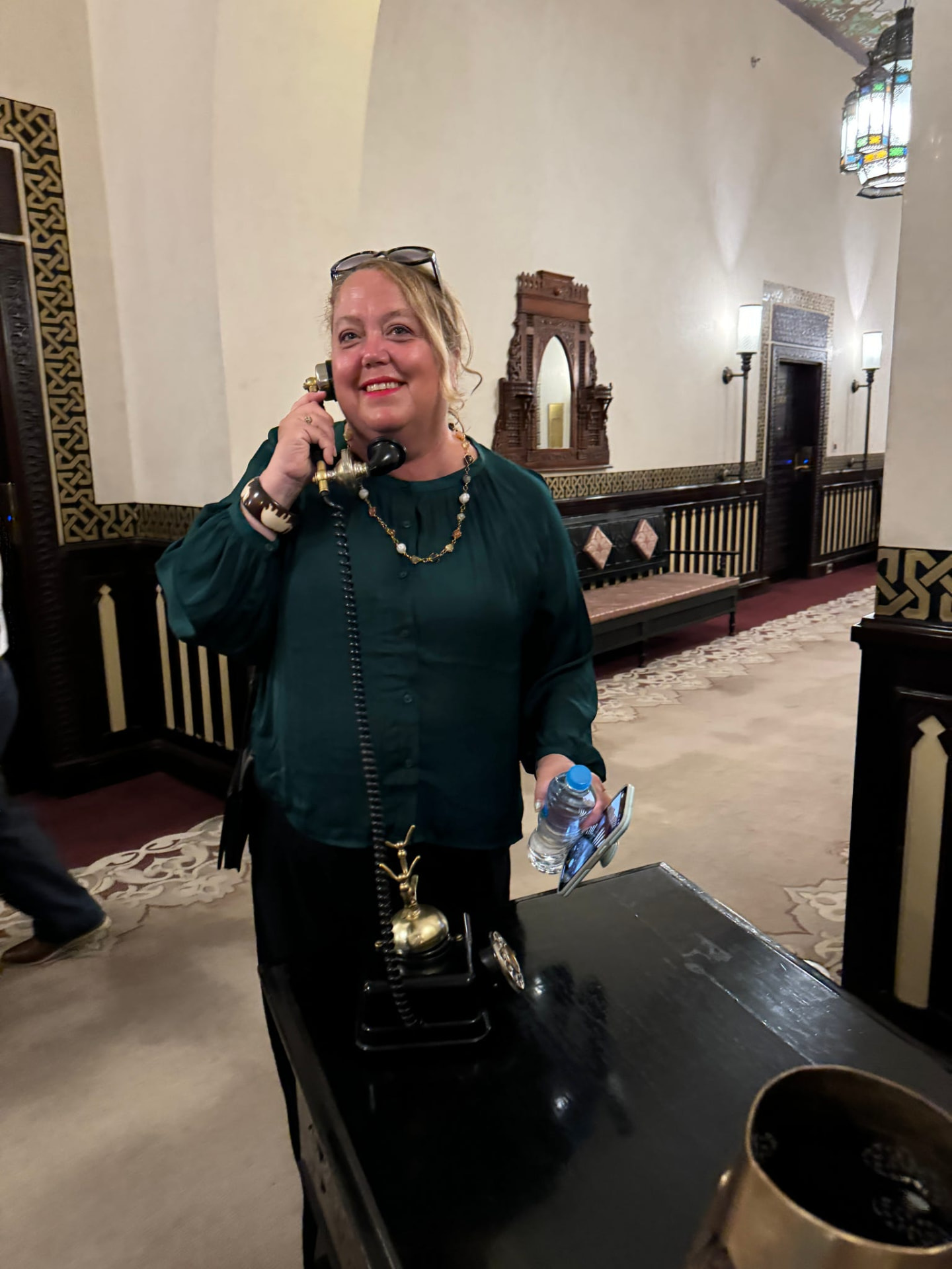 Christine Scheeler on a vintage telephone at the Old Cataract Hotel, Aswan